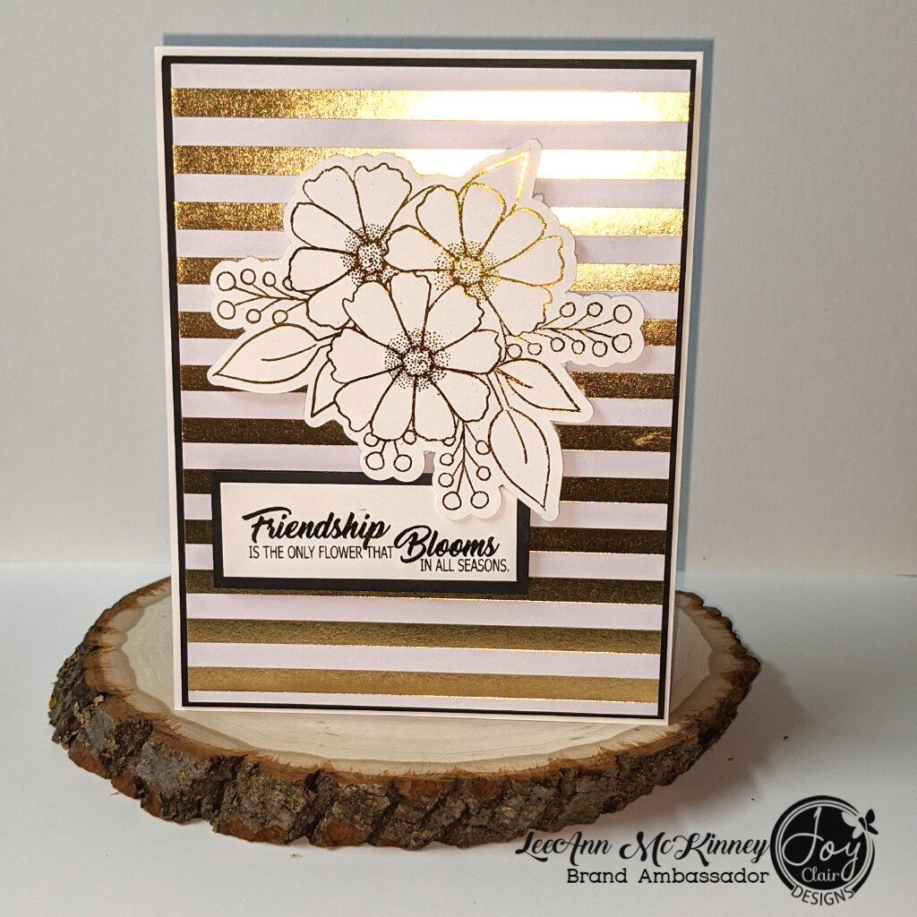 Friendship card using foiled flowers and sentiment