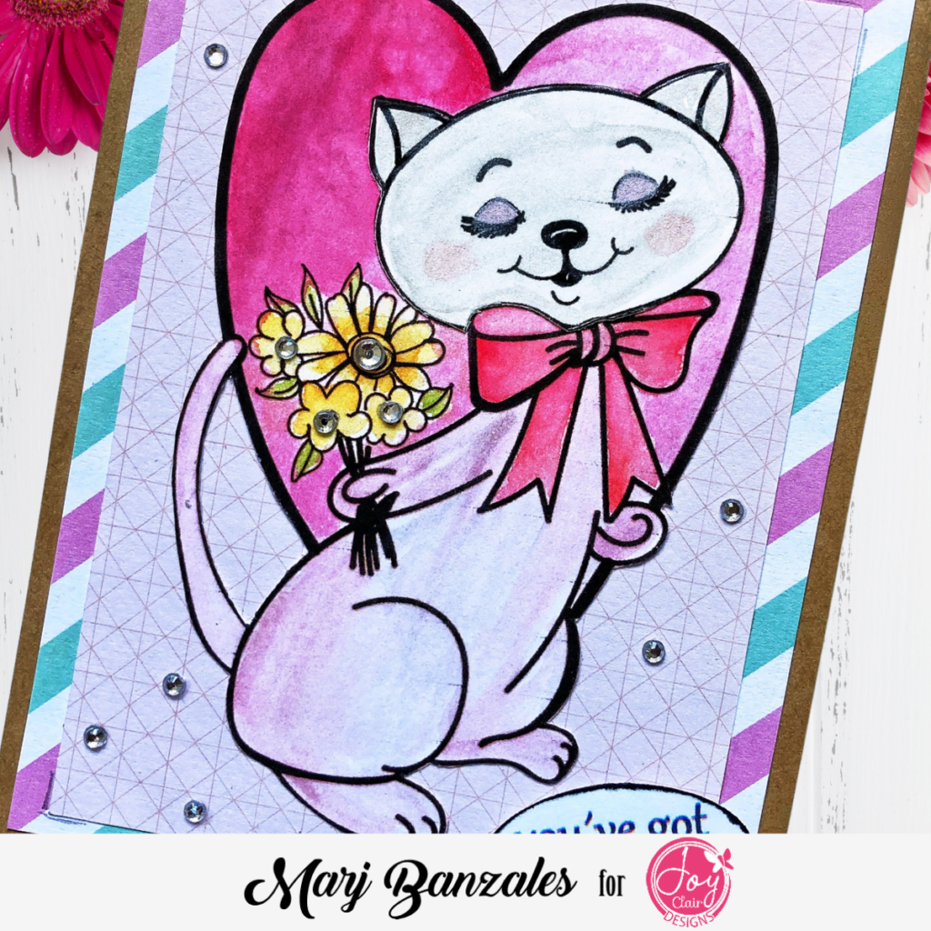 Cute kitty in a heart shape with flowers